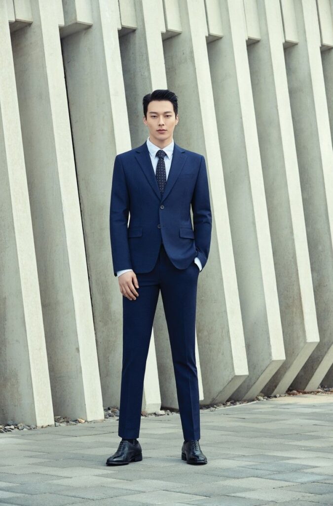 "Tailor in Kathmandu stitching custom suit"