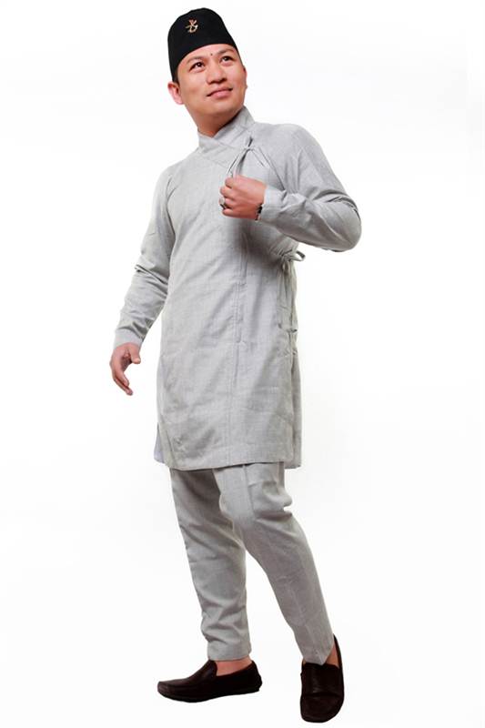 the traditional Nepali male outfit,